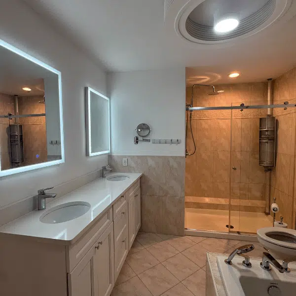 Bathroom vanity and glass shower