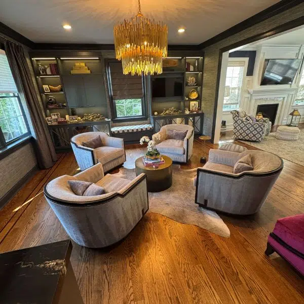 Living room with seating and wood floors