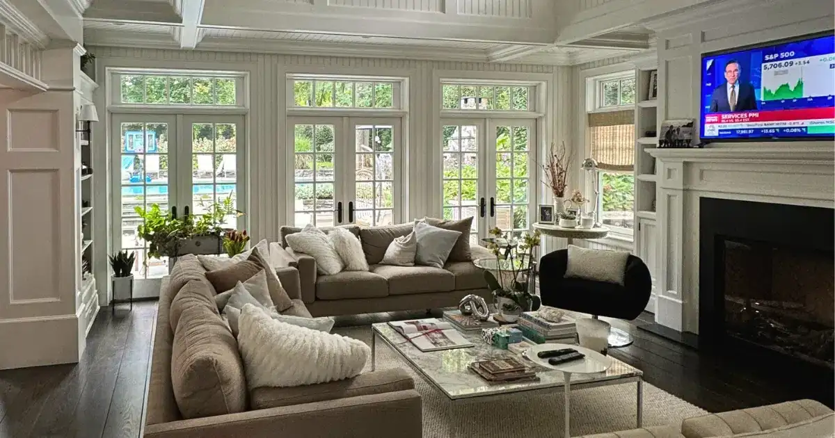 Living room with sofas and tall windows